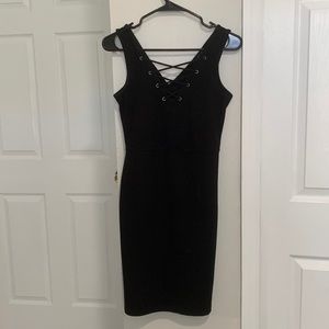 Tight black knee length dress